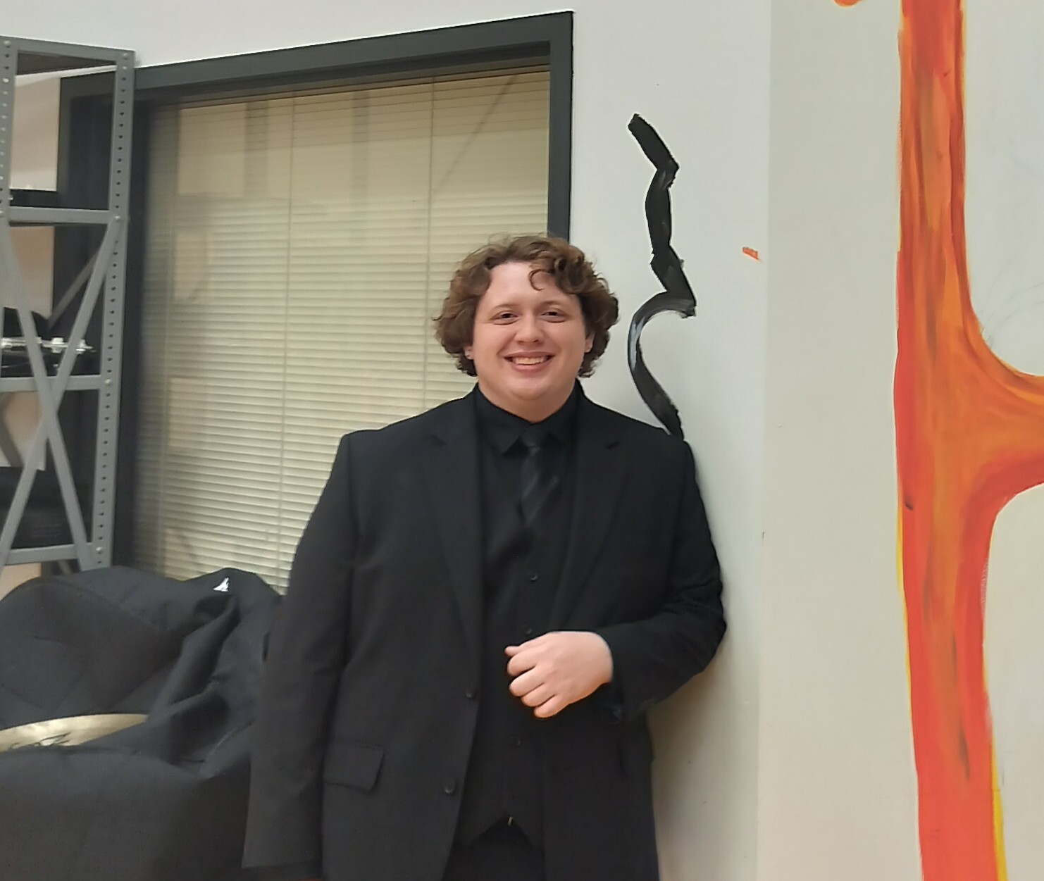 Matteo Botelho in formal concert attire.